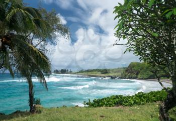 Waves break on Hamoa beach near Hana on Hawaiian island of Maui