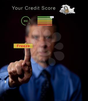 Senior caucasian man pressing freeze or lock button to lock his credit report and score