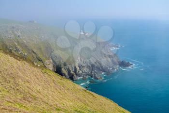 Sea mist or fog over the cliffs of Lundy Island off the coast of Devon