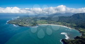 Aerial view of Hanalei Bay and Princeville on hawaiian island of Kauai from helicopter flight