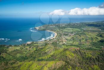 Aerial view of Hanalei Bay and Princeville on hawaiian island of Kauai from helicopter flight