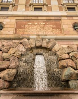 Waterfall in front of Royal Palace in Gamla Stan, Stockholm, Sweden