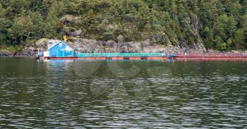 Industrial scale salmon and trout fish farming installation near Stavanger in Norway