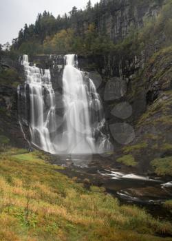 Dramatic Skjervsfossen waterfall near Skjervet road between Granvin and Voss in Norway