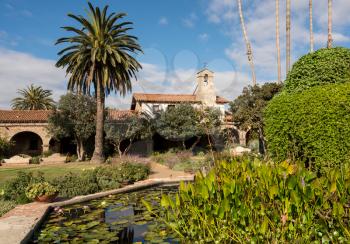 Brick lily pond in garden of the Mission at San Juan Capistrano, California