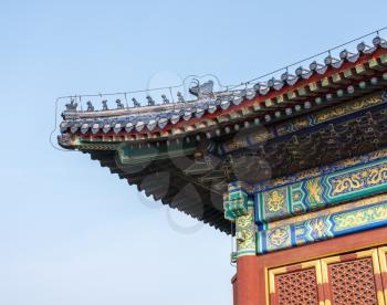 Ornate pottery tiles and carvings on roof of Temple of Heaven in Beijing, China