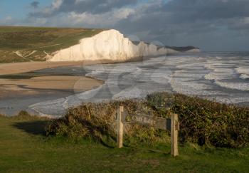 Strong waves by the chalk cliffs of the Seven Sisters at Cuckmere Haven
