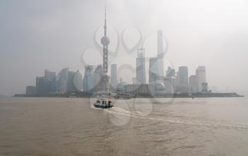 SHANGHAI, CHINA - 25 OCTOBER 2018: Police launch by Shanghai downtown on misty smoggy morning
