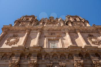 Ornate stone carvings on the Clericia church or cathedral in Salamanca Spain