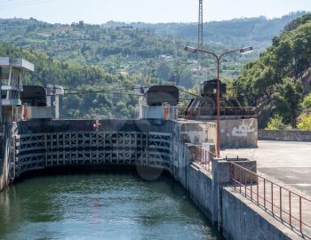 River cruise boat entering the lock of the Carrapatelo dam on River Douro