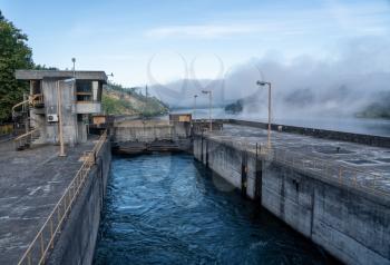 Filled lock as cruise boat leaves the Crestuma Lever dam on River Douro in Portugal