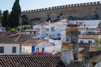 Rooftop view to the city walls in the old medieval city of Obidos in Portugal