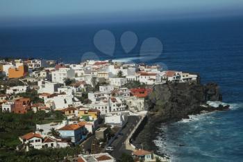 Costa Adeje, Tenerife, Spain - July 28, 2013: The islands of Tenerife is a resort for tourists. Coast of the sea and hotels on the beach.