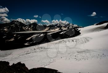 Mountain landscape with snow. Snow in the mountains. Mountain landscape.