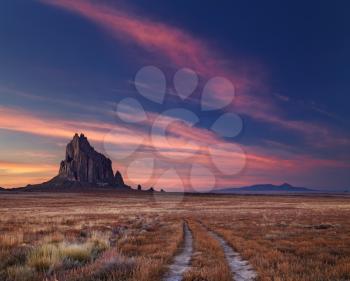 Shiprock, the great volcanic rock mountain in desert plane of New Mexico, USA