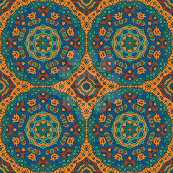 Seamless background. Ethnic doodle motives. Zentagl. Orange, green and blue