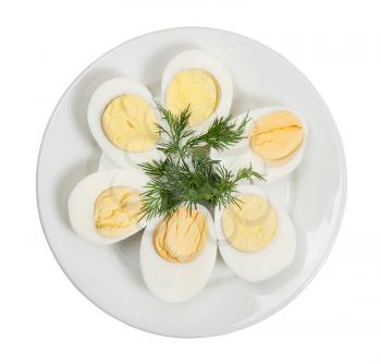 Boiled hen eggs in white plate isolated on a white background. Top view.