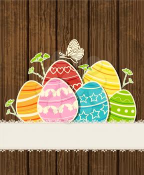 Vector wooden background with decorative Easter eggs 