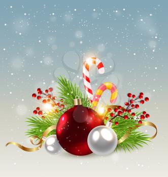 Christmas background with red decorations, candy cane and green fir branch. Design for Christmas card.