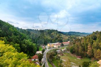 View from Dracula's castle in Bran, Transylvania, Romania. The road in town Bran at the foot of the Carpathian Mountains