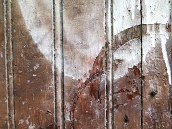 Old wood planks with white peeling paint background
