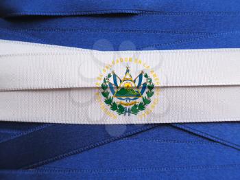 El Salvador flag or banner made with blue and white ribbons