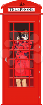 Beautiful young girl in bright clothes speak the English classic red phone booth