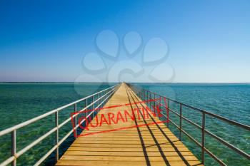 absolutely empty pier for swimming in the red sea and the quarantine stamp