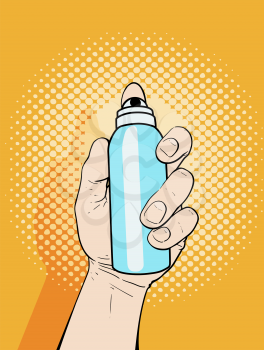 Male hand holding an aerosol can of paint or deodorant spray