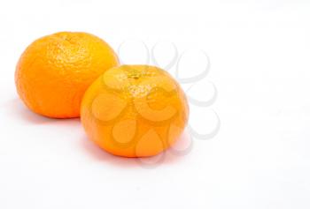 Detail image of mandarine isolated on the white background.