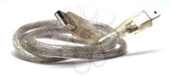 Closeup image of white USB cable with the white background.