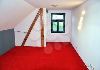 New bedroom with red carpet.