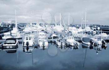 Tilt-shift shot of harbor for small motorboats.