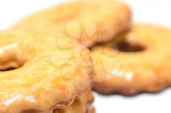 Macro shot of milk cookies with chocolate on a white background.