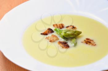 Cream Asparagus Soup with Whole Green Asparagus Heads and Croutons.