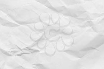 Full frame texture of blank crumpled and wrinkled white paper background.