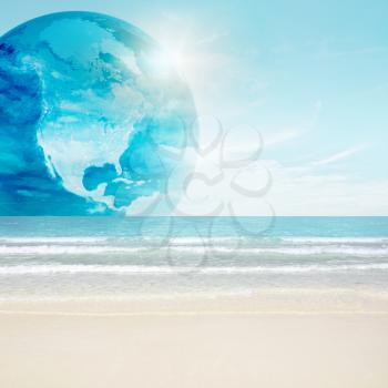 America globe on tropical beach. 3d and photo montage