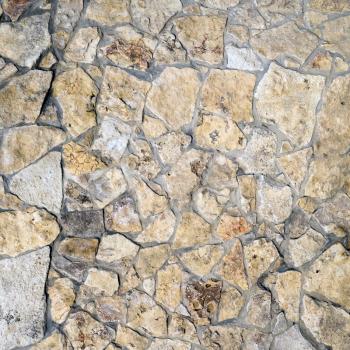 Stone wall texture. Old ancient detailed surface