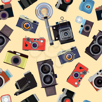 Cartoon seamless pattern with illustrations of retro photo cameras. Photo equipment with flash pattern, device photocamera vector