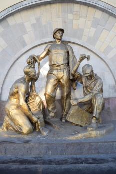 MOSCOW, RUSSIA - NOVEMBER 28, 2015: The sculpture of metro builders near metro station Elektrozavodskaya
