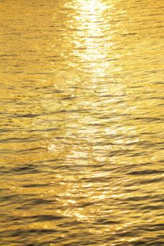 Sun reflection out of golden river