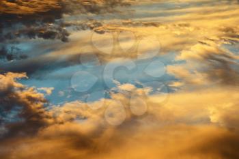 Colorful Heavenly Orange Warm Clouds On Sky at Sunset