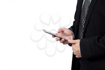 Businessman in Back Suit and Tie Holding Smartphone in Hand And Typing a Message Against White Background