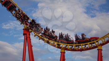 VIENNA, AUSTRIA - AUGUST 16, 2019 -  Roller Coaster Ride in Amusement Park Prater on August 16, 2019 in Vienna, Austria