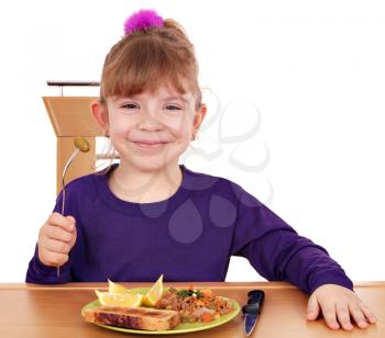 happy little girl eating
