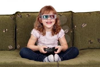 happy little girl with 3d glasses play video game