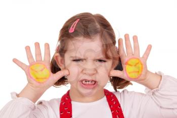 angry little girl with angry smiley on hands