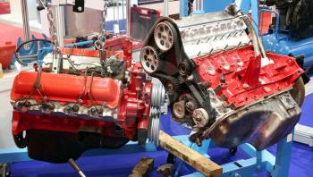 workshop with car engines and parts