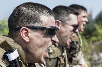 US Marines shouting at somebody showing war face