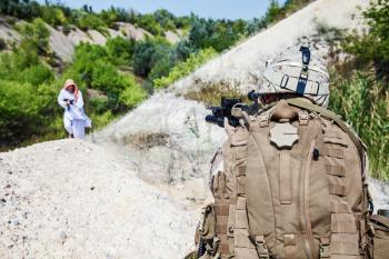 US marines fighting muslim warrior in the mountains